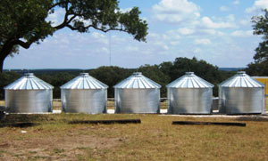 corrugated steel tanks in a row