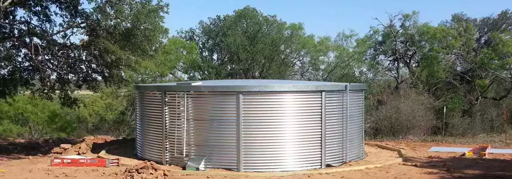 Corrugated steel tank on a concrete pad