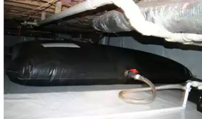 collapsible pillow tank in crawlspace